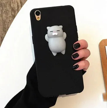 Soft silicone TPU iPhone case with a 3D cartoon cat design, shown in pink.
