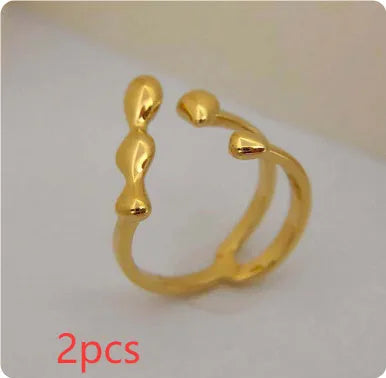 Brass spherical ring for women in gold or silver plating.