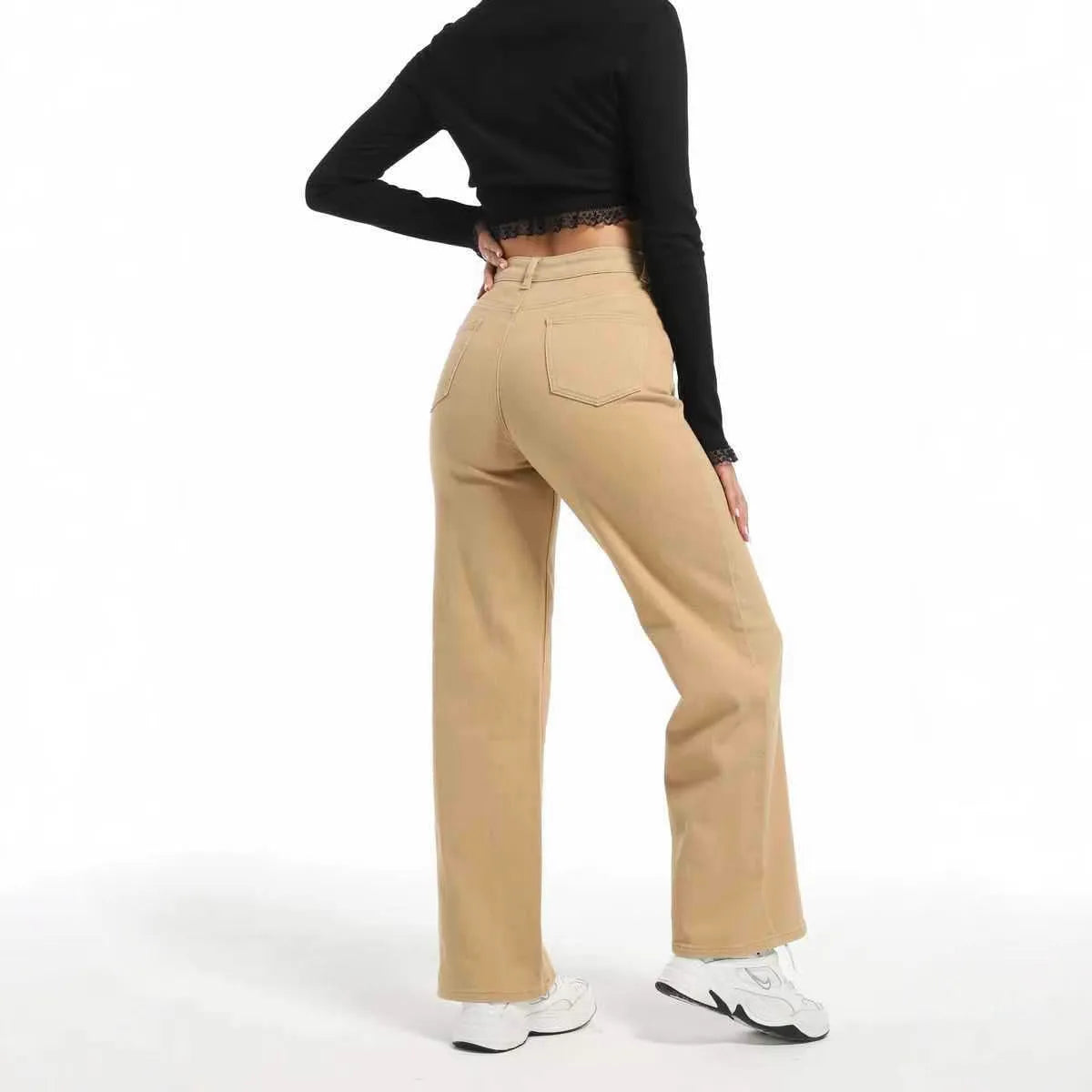 Women's high-waist straight wide-leg jeans in apricot colour on a hanger.