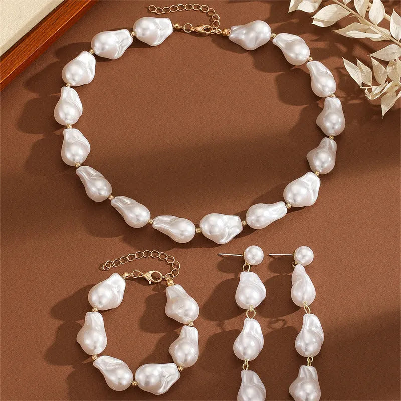 Baroque imitation pearl jewellery with irregular teardrop necklace, bracelet and earrings for women