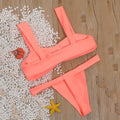 Solid colour split bikini swimsuit in orange with nylon outer and polyester lining, sizes S M L
