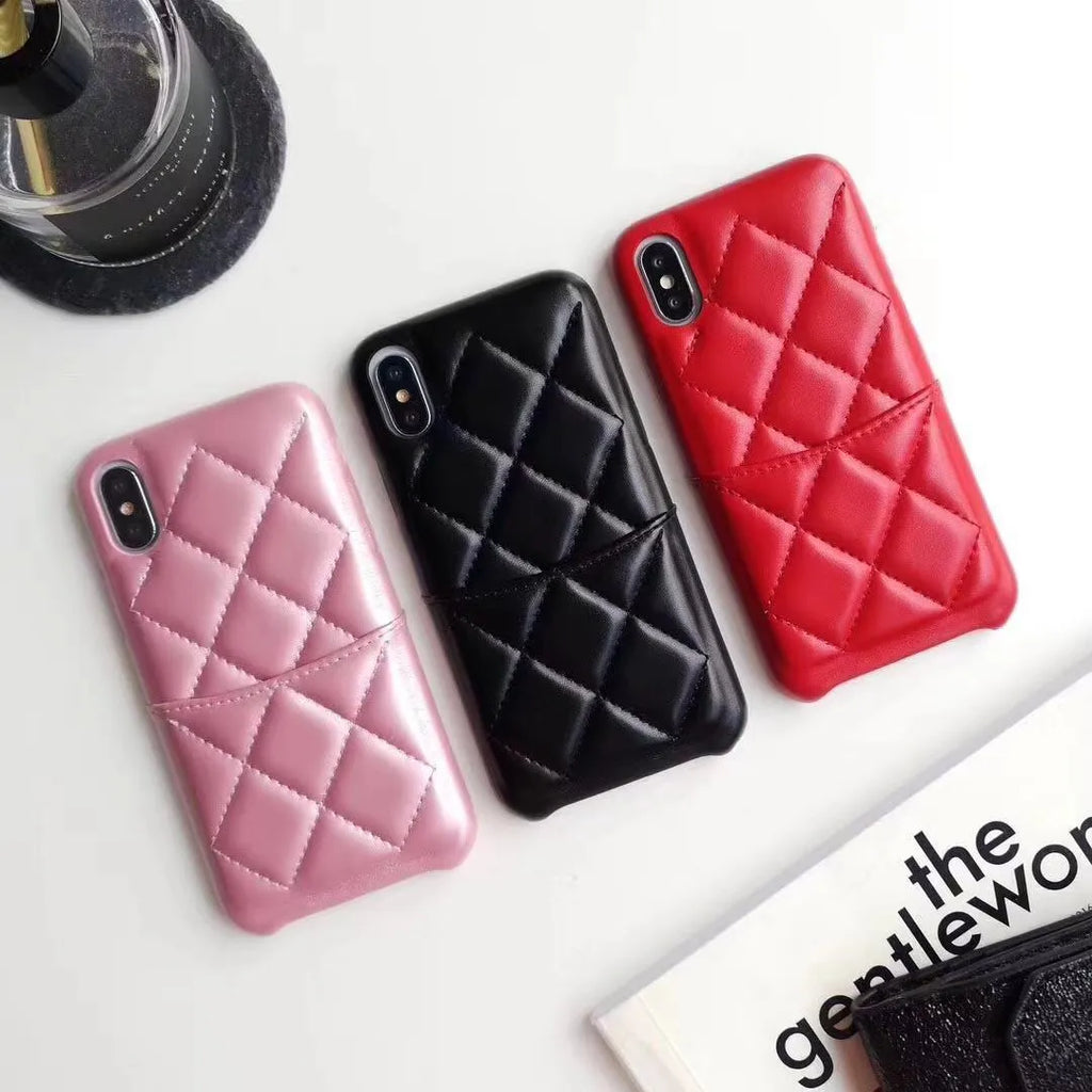 Black leather phone case for iPhone XS Max on a table
