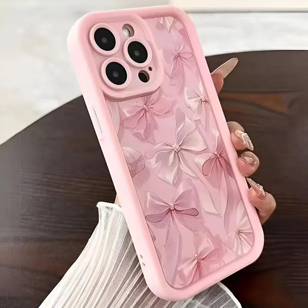 Pink silicone phone case with custom Tianyan ladder pattern and bow detail, compatible with Apple iPhone models