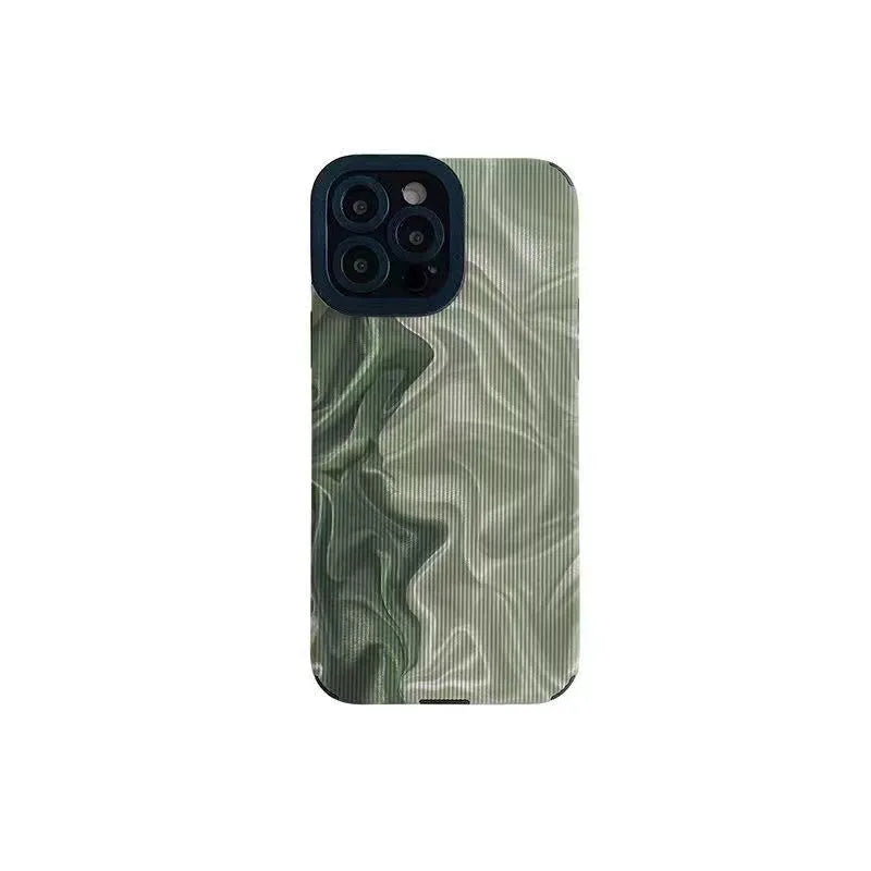 Silicone iPhone case with Chinese-style geometric metal-stamped design on imitation leather