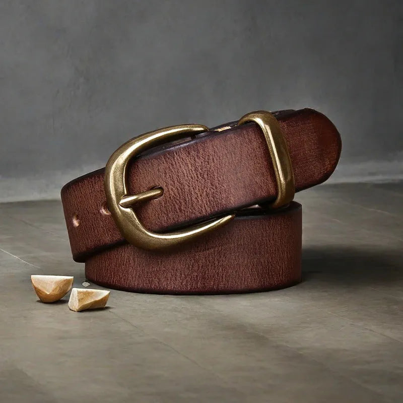 Men's black genuine leather casual belt with a copper pin buckle, showing length adjustment holes.