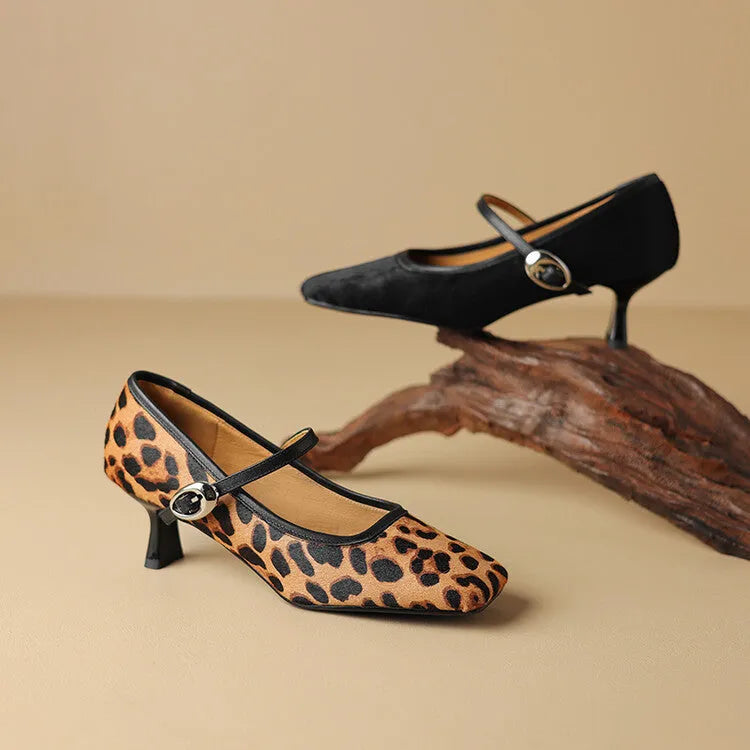 Black women's square toe stiletto heel ankle-strap shoes with a textured horse hair upper.