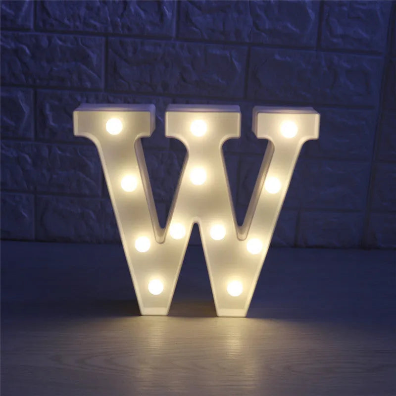 White plastic LED marquee letter sign with warm white glow, 22cm tall