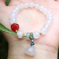 Natural white agate round beads lotus seedpod bracelet with hand-woven Chinese style design