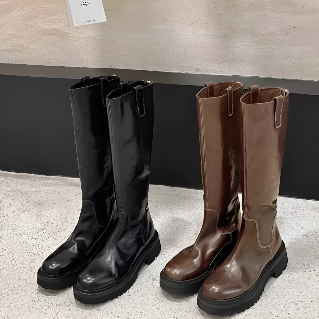 Women's black chunky heel knight boots with round toe and back zipper showing side profile