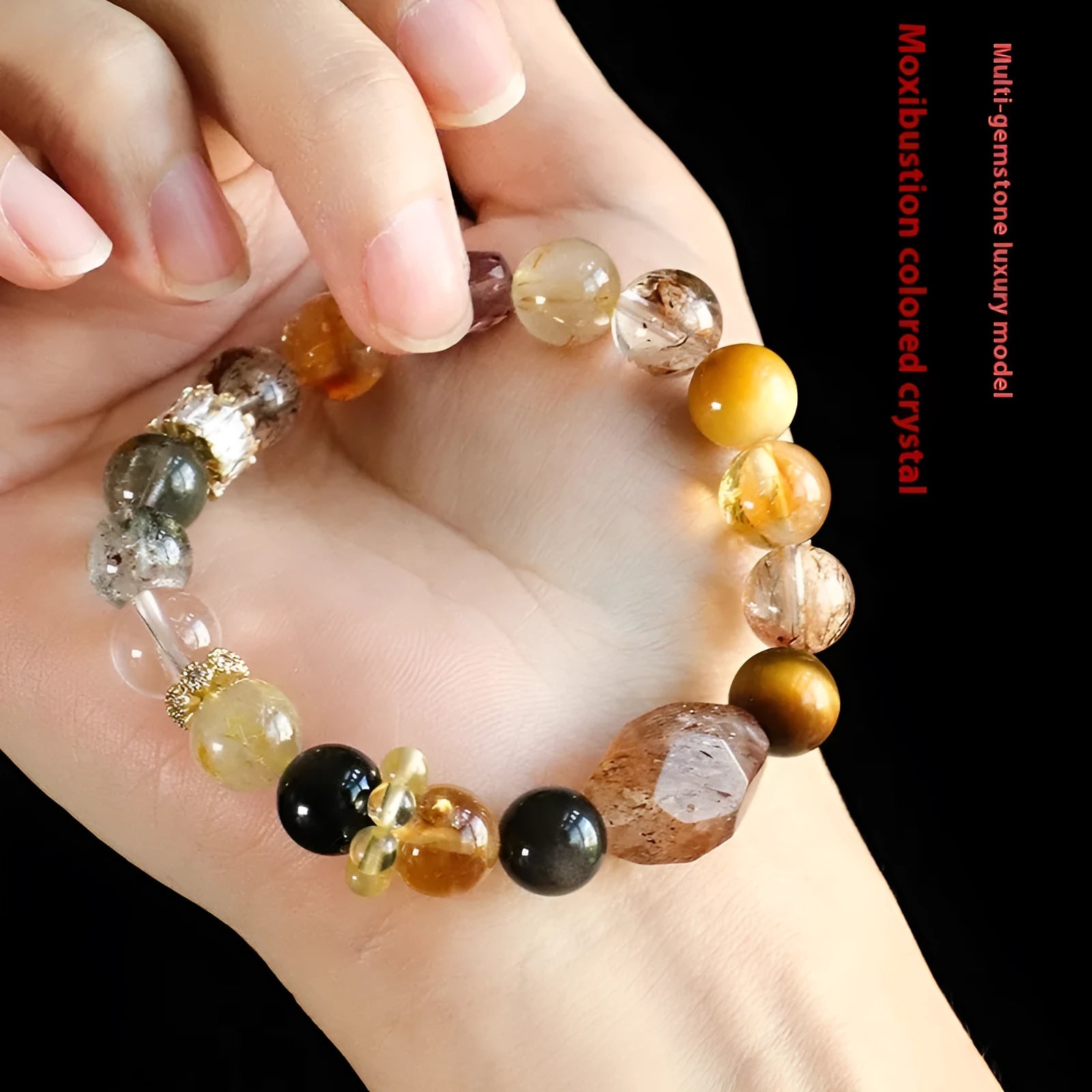 Handmade black and gold string bead bracelet made with natural Duobao crystal.
