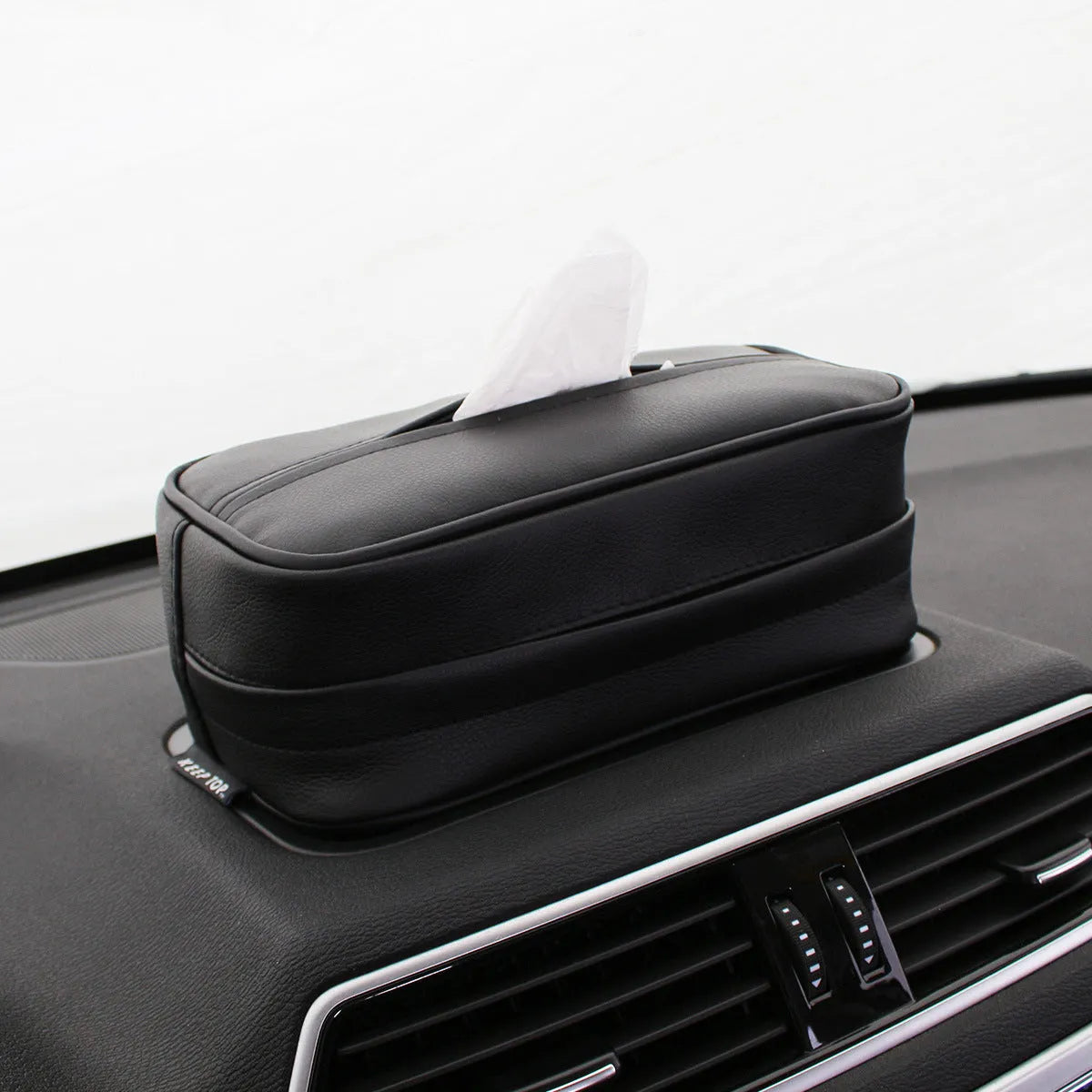 Black leather hanging storage organiser bag with strap for car or home use