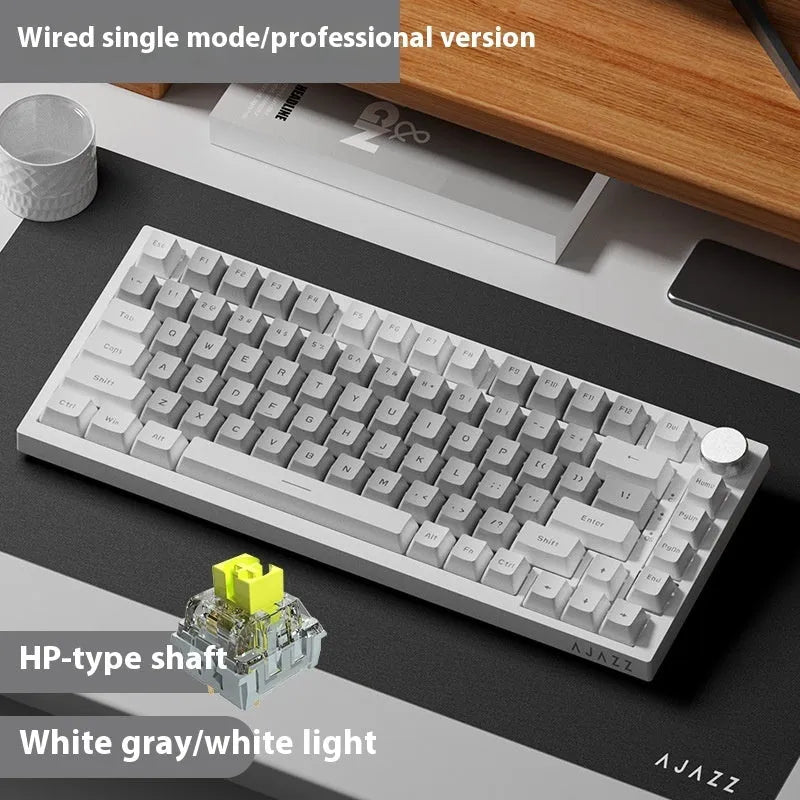 Wireless Bluetooth three-mode mechanical keyboard with hot swap side engraving, black PBT keycaps on desk
