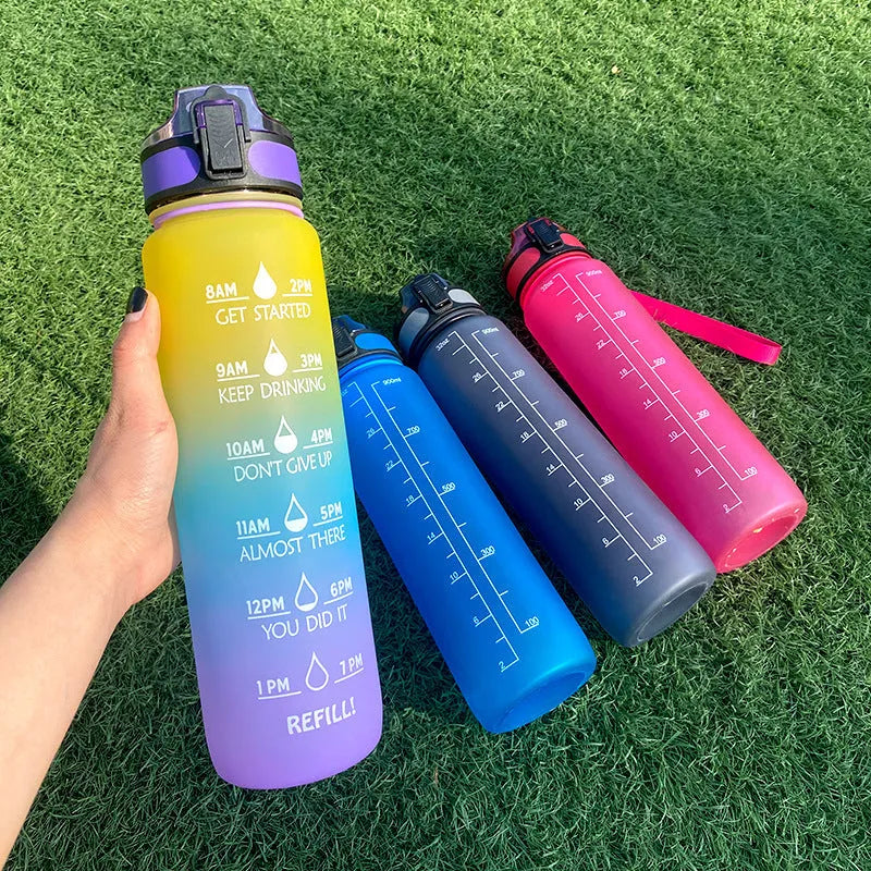 1 litre Tritan water bottle with time markers and gradient colour design