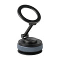 Car navigation suction cup folding mobile phone bracket in black and silver on dashboard