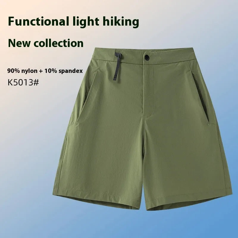 Men's solid colour sports shorts with 3D cut and stretch fabric for running.