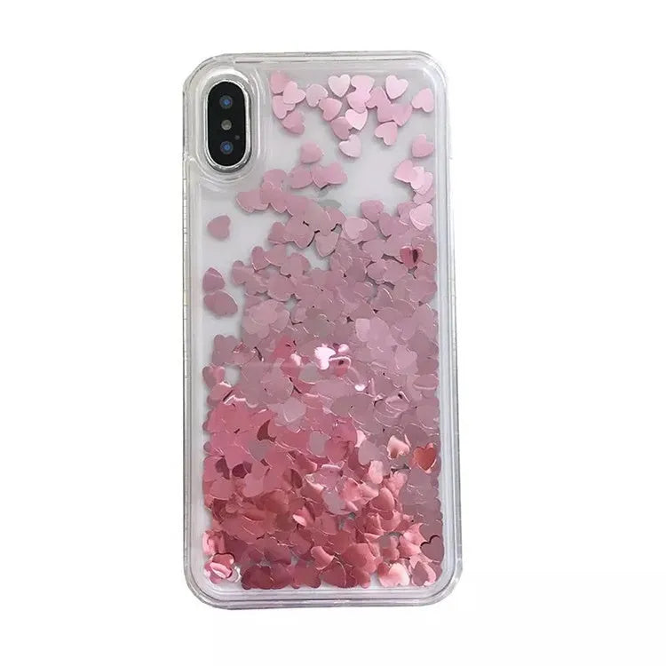 Quicksand flowing love heart silicone phone case in transparent soft TPU bumper for iPhone, available in pink red silver.