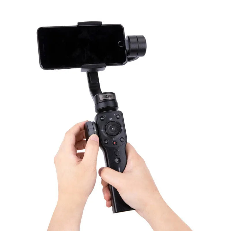 Black handheld smartphone gimbal stabiliser for video filming on a dark background.