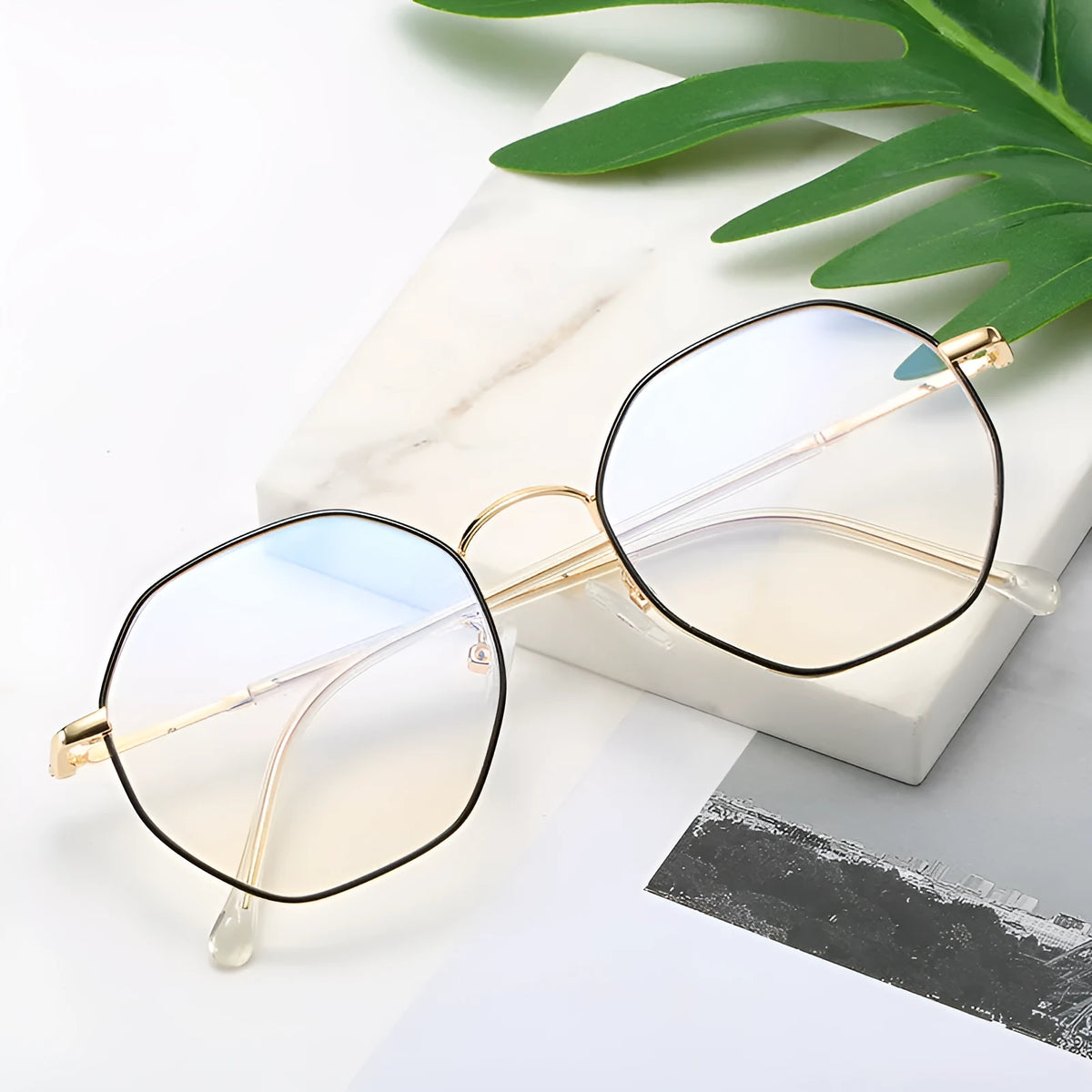 Irregular geometric anti-blue light glasses with metal alloy frame splicing, white flat lenses, and unisex full-frame design in black, gold, or silver.