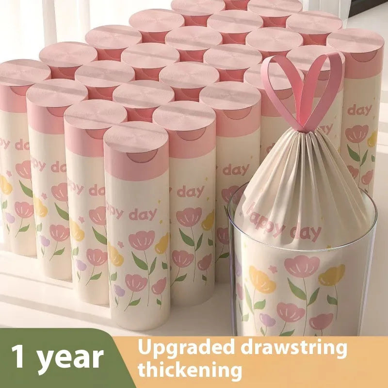 Pile of bold pink degradable drawstring garbage bags with argy wormwood.