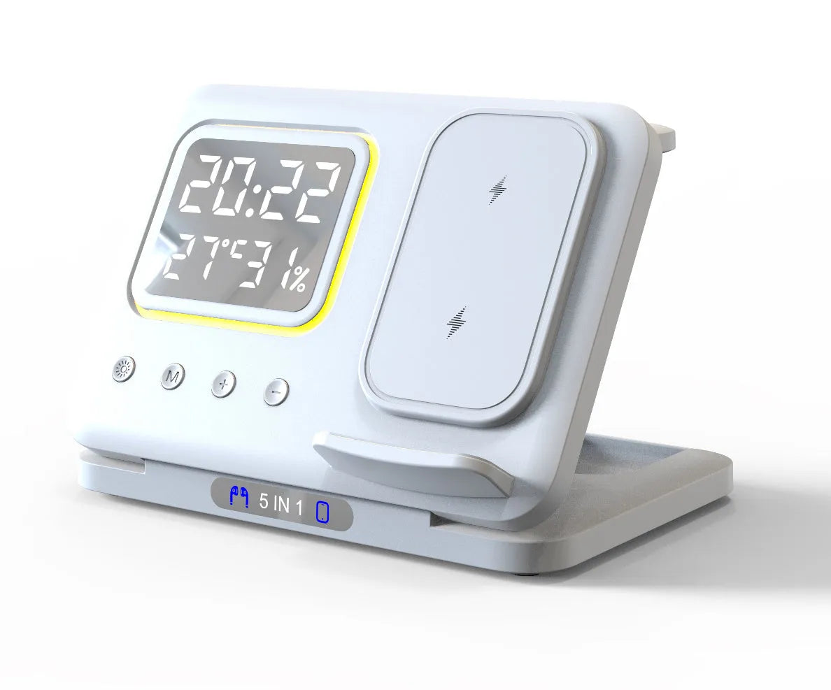 Black and white wireless charging dock station with digital clock display charging a phone, watch and headphones