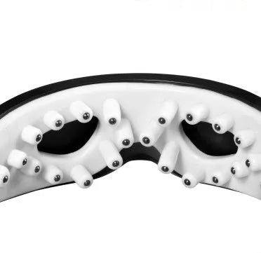 Eye massager with adjustable headband, silicone contacts, and 9 vibration modes in black and white colour