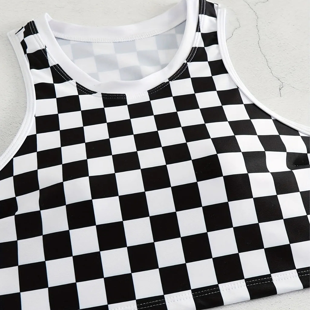 Women's black and white checkerboard racing one-piece swimsuit with backless design and suspender straps