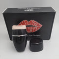 Black electric lip plumper device with silicone tip and 3-speed adjustment buttons
