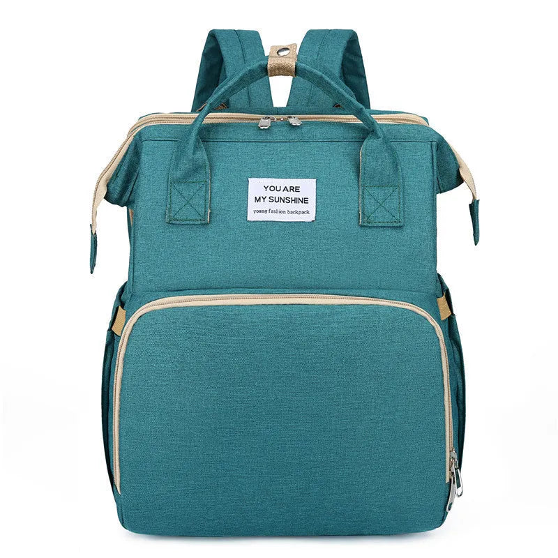 Lightweight nylon mother and baby bag with USB port and portable folding crib function in multiple colours