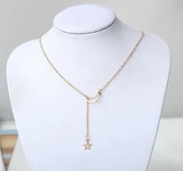 Simple moon star clavicle necklace in alloy with diamond treatment, shown in golden and silver colour options.