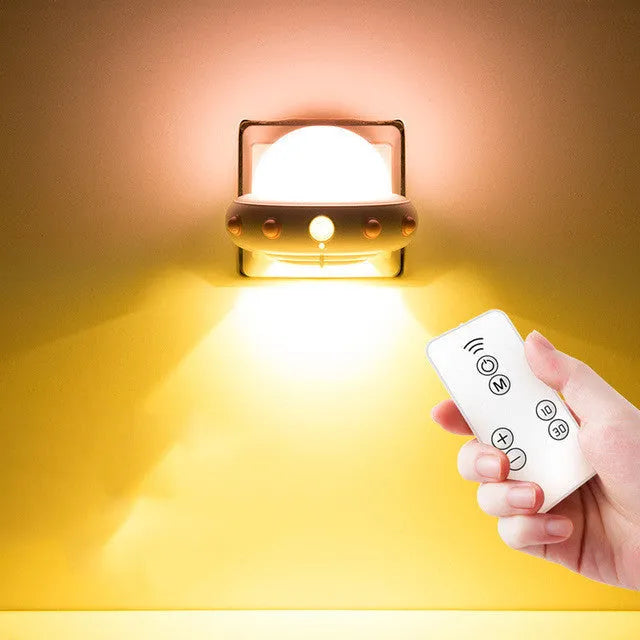 Remote control UFO bedside night light in blue, pink, or white with colourful LED lighting