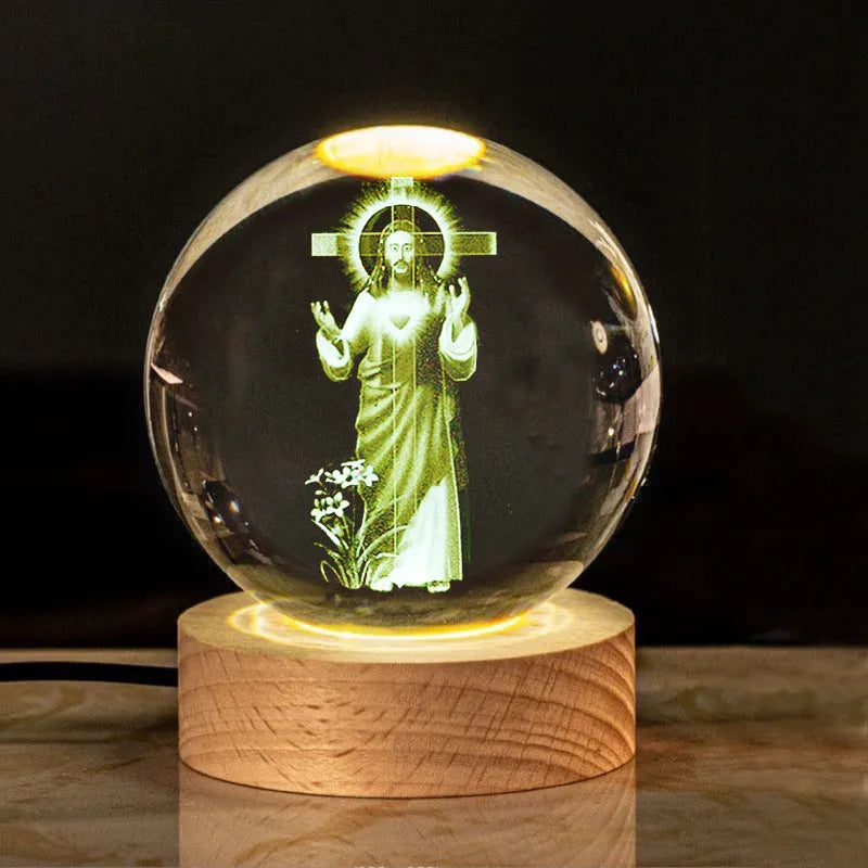 6cm white crystal ball desk ornament with laser-engraved cross design on a solid wood warm light base.