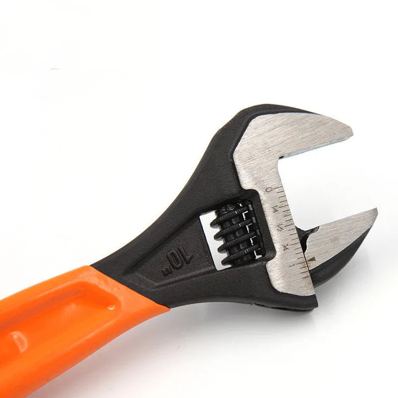 Orange manual multi-function wrench with 300mm length and 36mm jaw opening on a workbench
