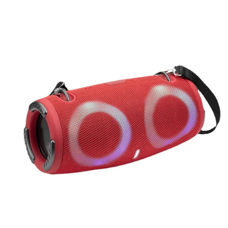 War Drum portable Bluetooth speaker with coloured LED lights in a black finish, showing carrying strap and control buttons.