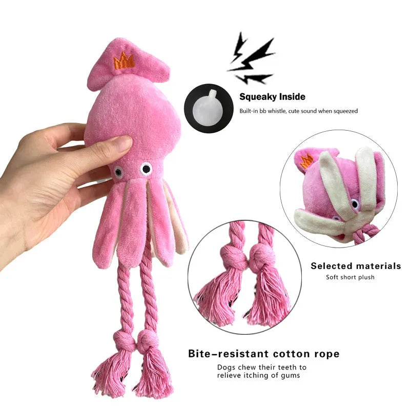 Pink squid-shaped plush dog toy with rope texture and a built-in squeaker.