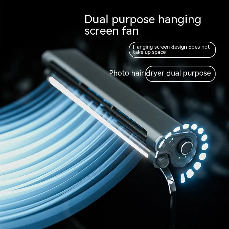 Black USB-powered clip-on bladeless fan with LED light attached to a laptop screen.