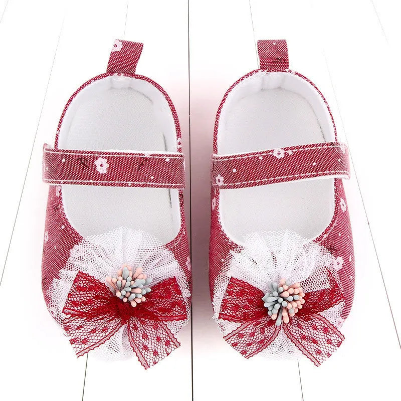 Baby princess shoes with soft sole, cotton upper, and Velcro fastening in blue fuchsia and orange colours