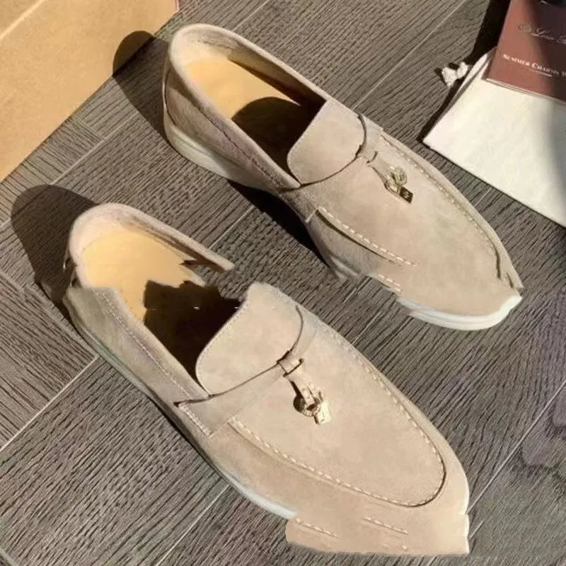 High top slip-on loafers with round toe cap and visible stitching on artificial PU upper