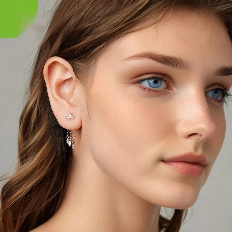 Pair of silver ear studs with small flower and tassel front and rear structure, BSE1240 colour, on light background