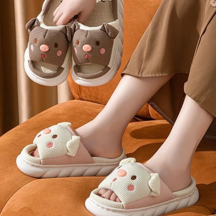 A pair of open-toe linen flip flop slippers for couples, shown in a choice of colours with a cushioned footbed.