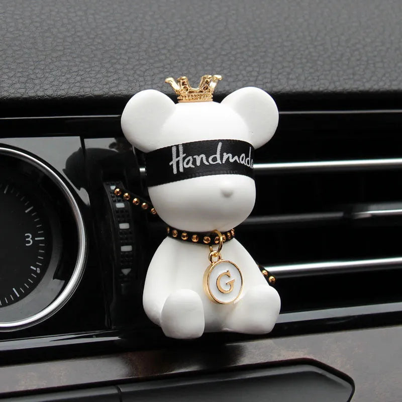 Black rivet bear car mounted gypsum perfume accessory clipped onto a car air conditioner air outlet
