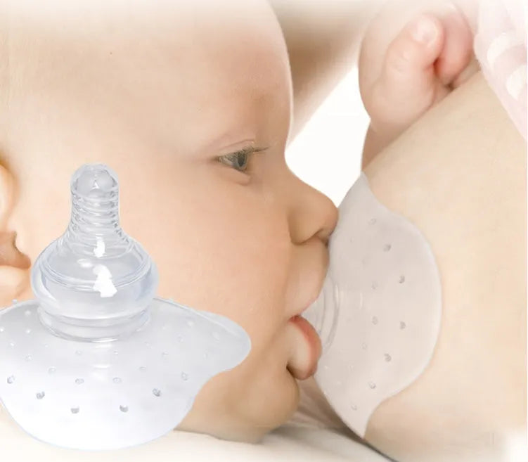 Nursing nipple protectors for breastfeeding mothers in transparent and pink colours