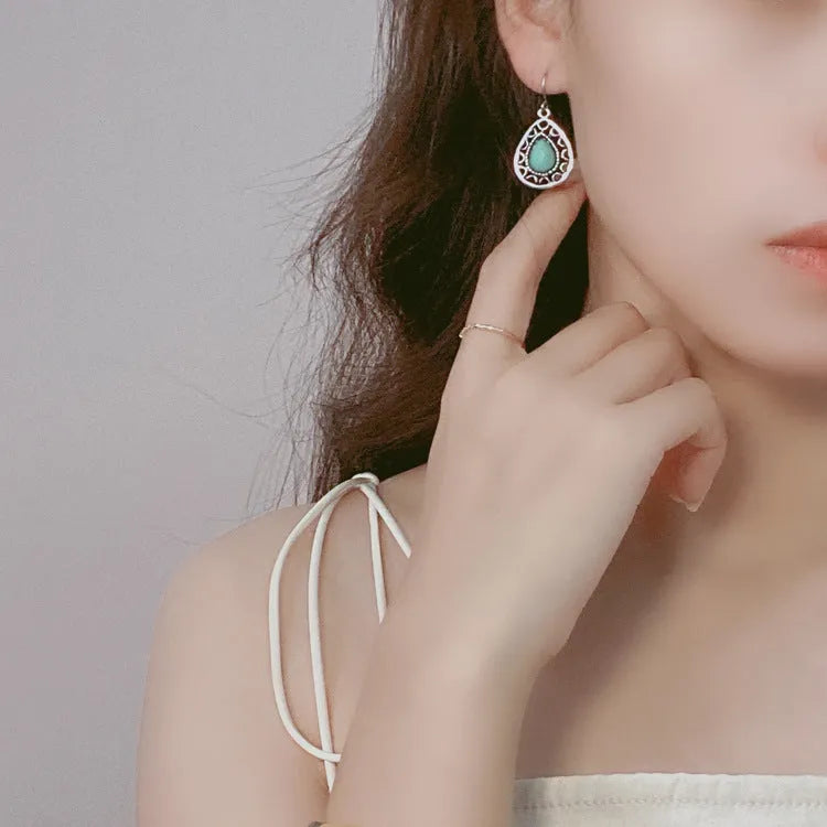 Alloy retro drop earrings in triangle and water drop shapes for women's holiday travel style