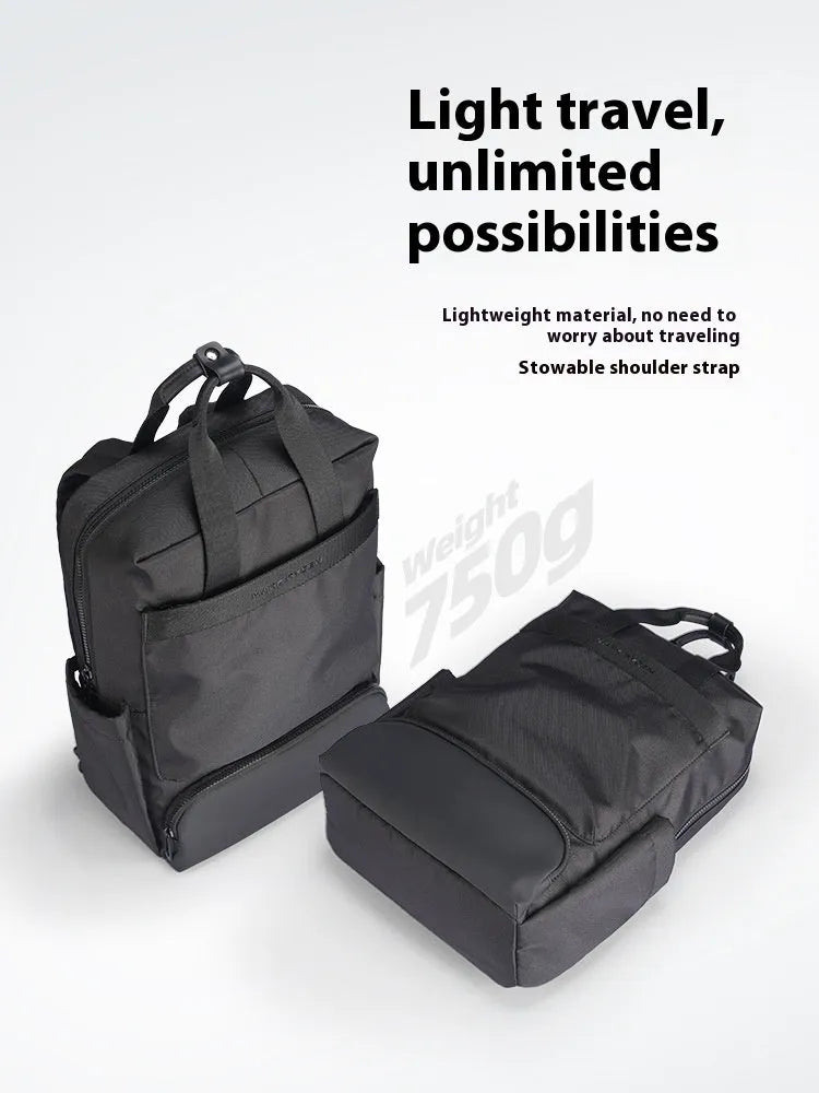 Black Oxford cloth computer backpack with a 20-35 litre capacity.