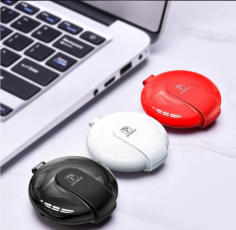 Black magnetic retractable car phone charger with 1m cable shown mounted in vehicle