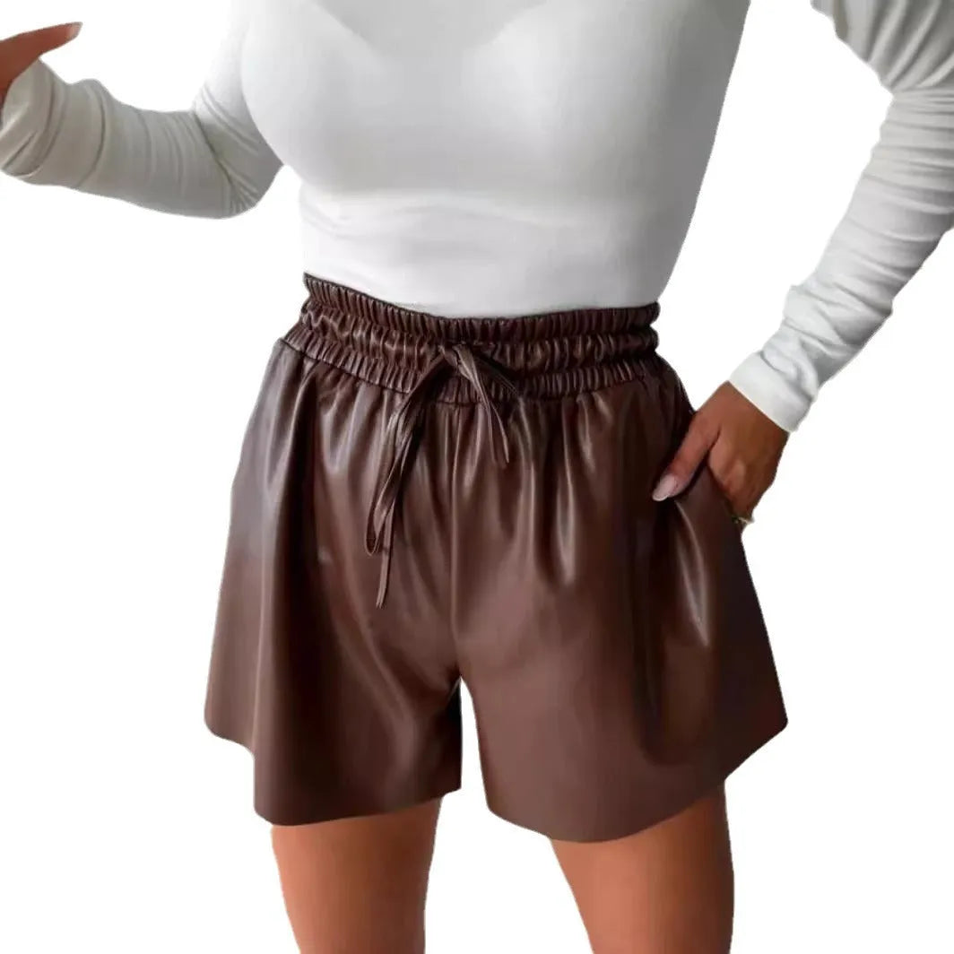 Black women's wide-leg casual shorts with drawstring lace detail on the waistband.
