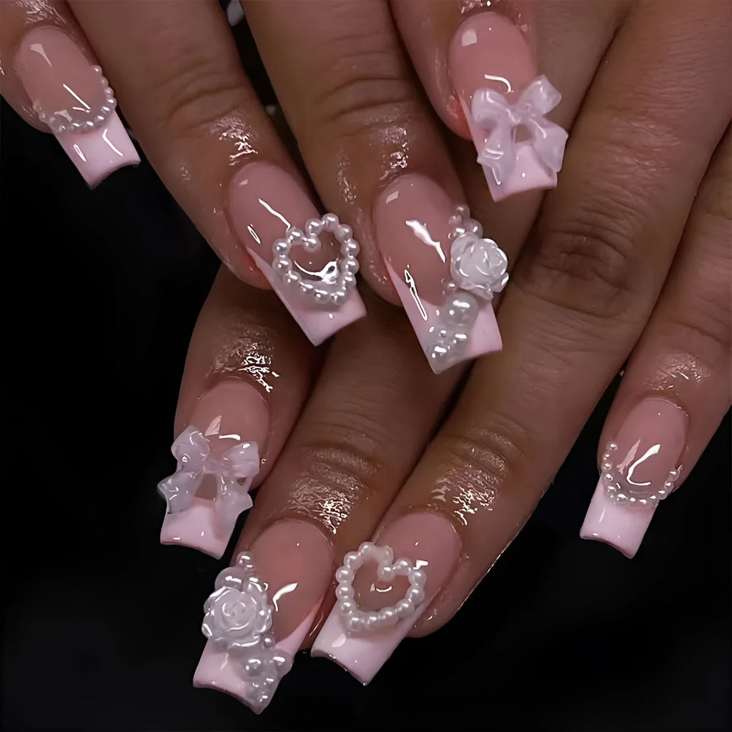 French Love Pearl fake nail stickers in colour XD93 with jelly glue and polish rub on a white background.