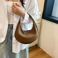Women's one shoulder crossbody underarm handbag in PU, dumpling shape, 23cm wide, 120cm strap, black