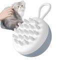 Blue handheld silicone dog shampoo brush with massage points for bath time.