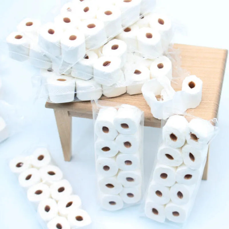 Miniature simulated toilet paper roll model for children's dollhouse play measuring 30mm by 15mm by 80mm
