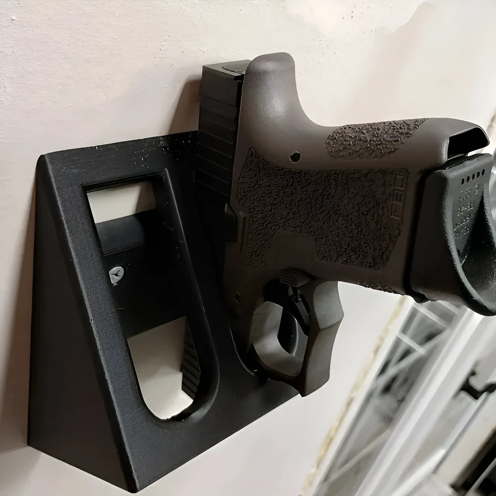 Black punk-style plastic pistol stand for gun display